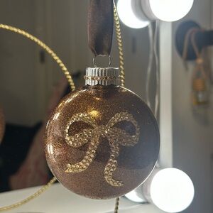 Glittering Brown Ornament with Gold Bow